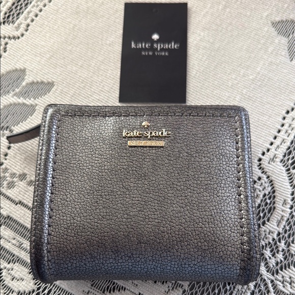 kate spade Handbags - Kate Spade Madison Silver Large Slim Billford
